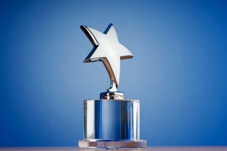 award with star on top